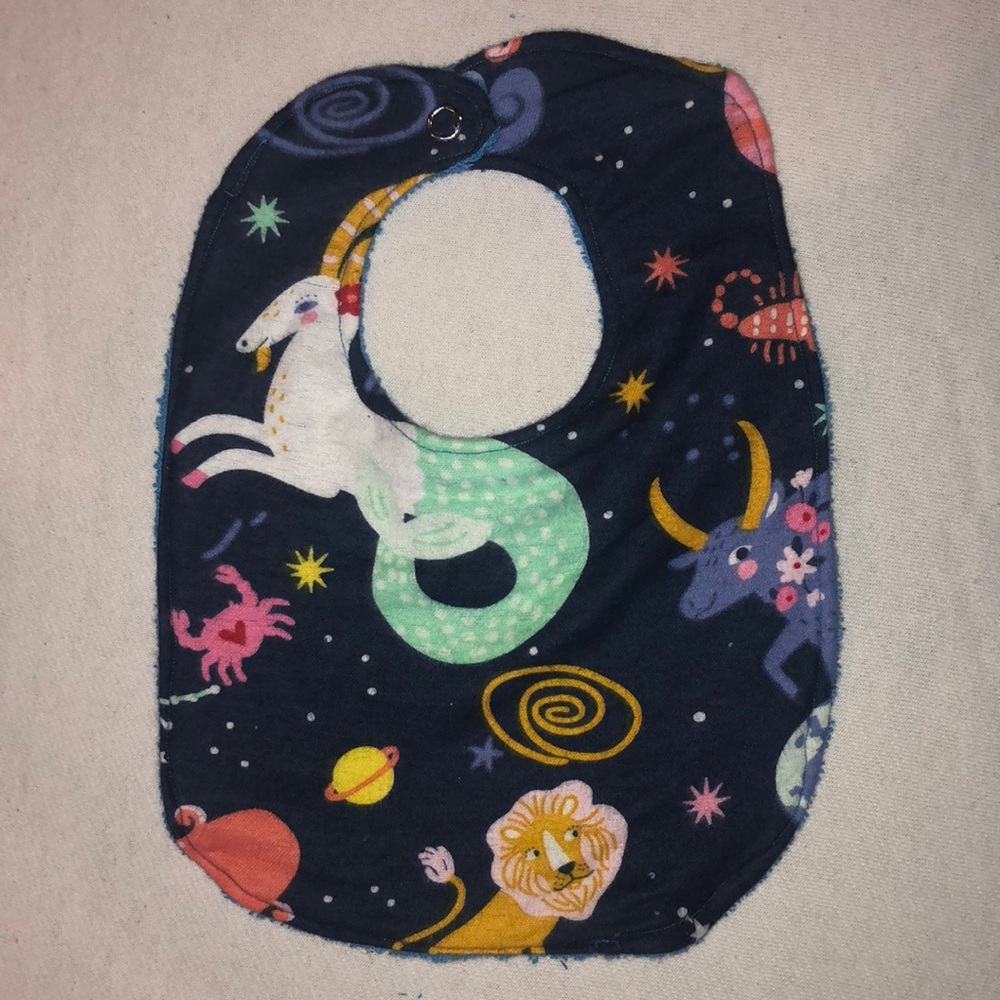 100% Cotton Reversible Zodiac Pattern Baby Bib in Blue w/Stars and Snap Fastener